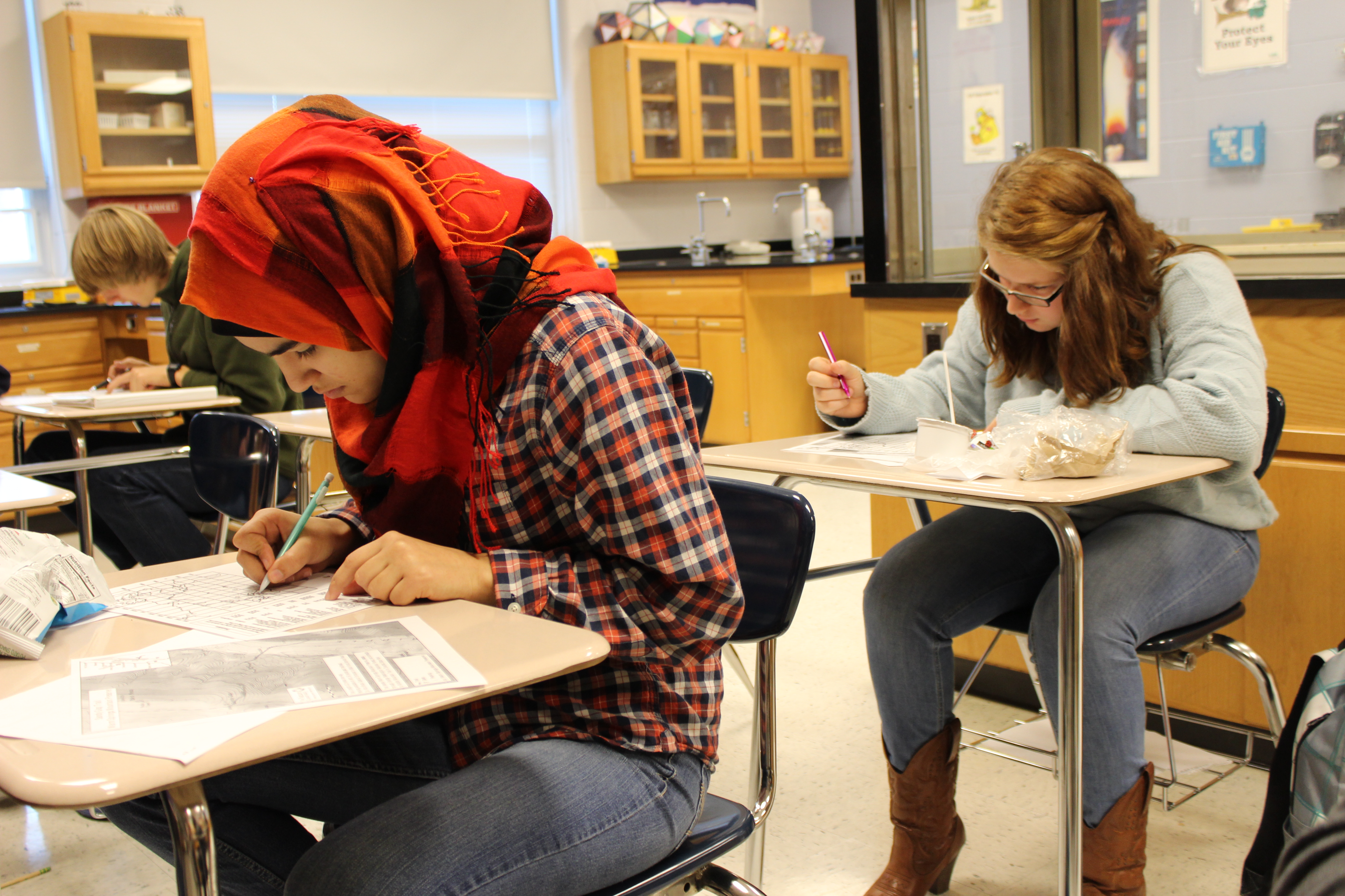 Girls doing their classwork.