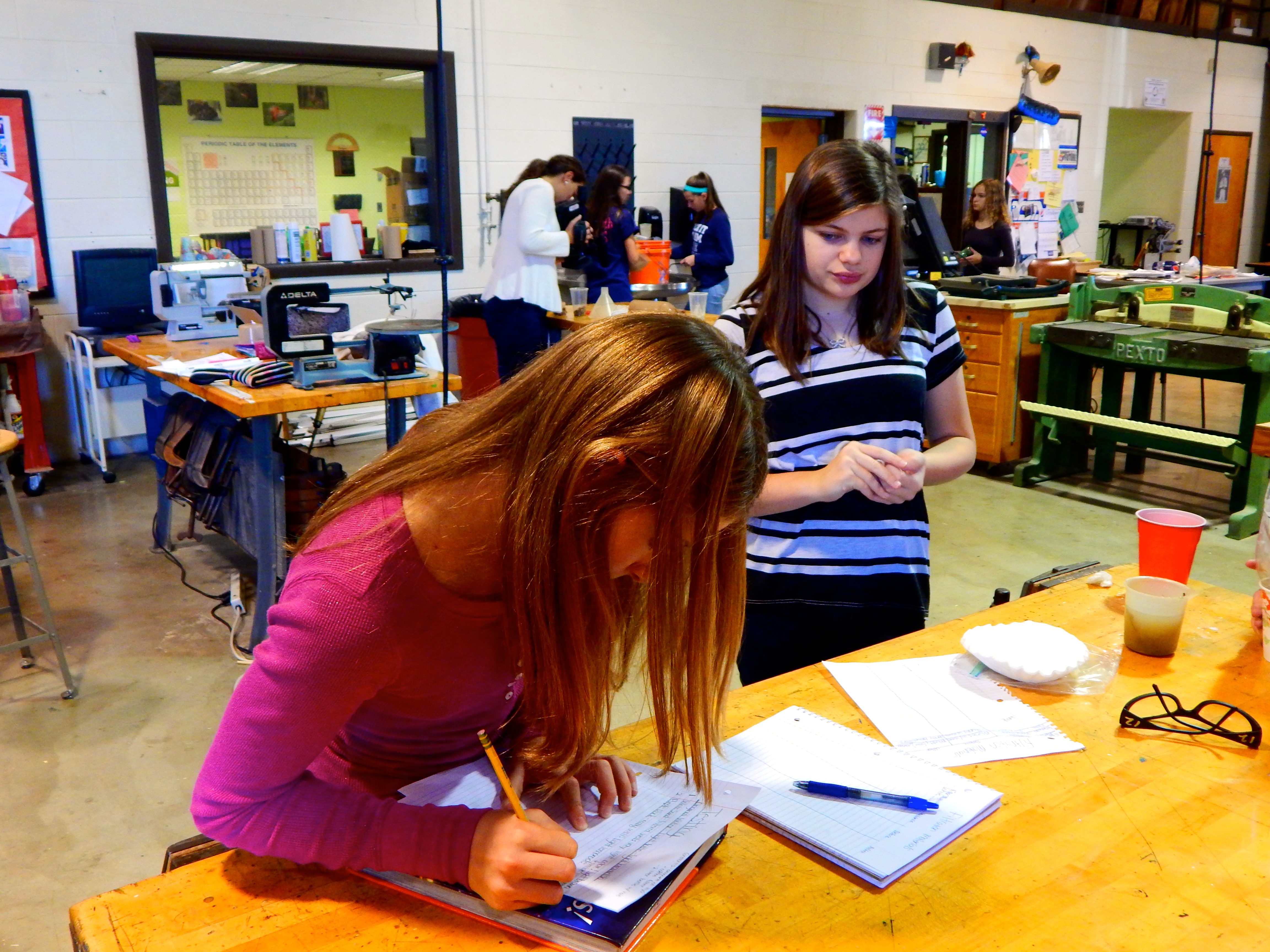 Abby records her group’s findings.